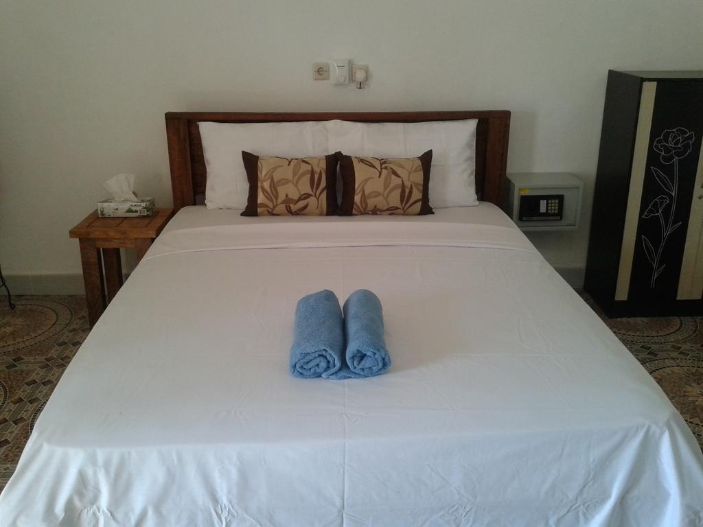 Putri Homestay Gili Meno Rum bild
